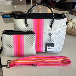 Neoprin bag with strap and clutch.  Brand new!